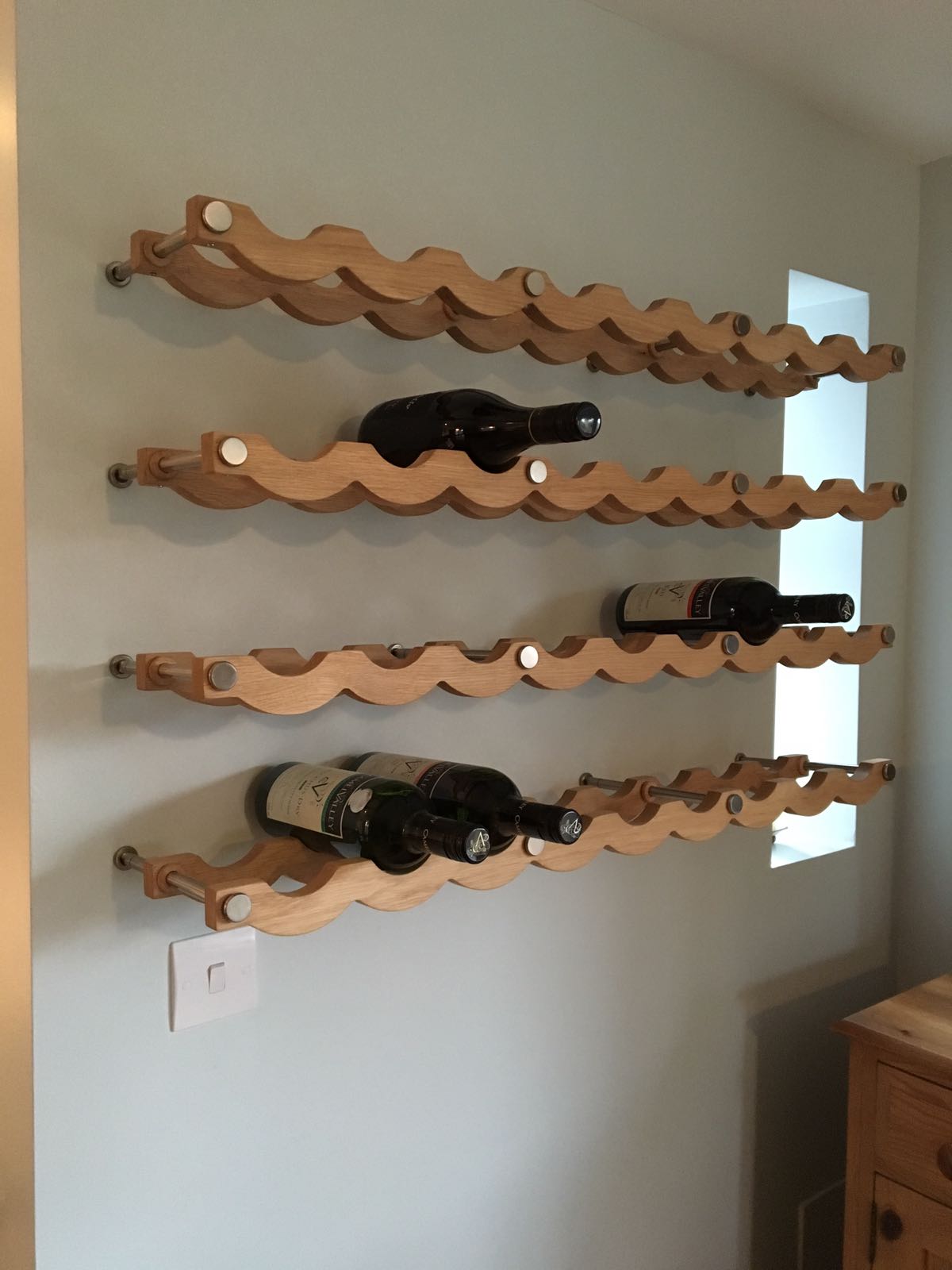 handmade bespoke oak wine rack made on the Wirral