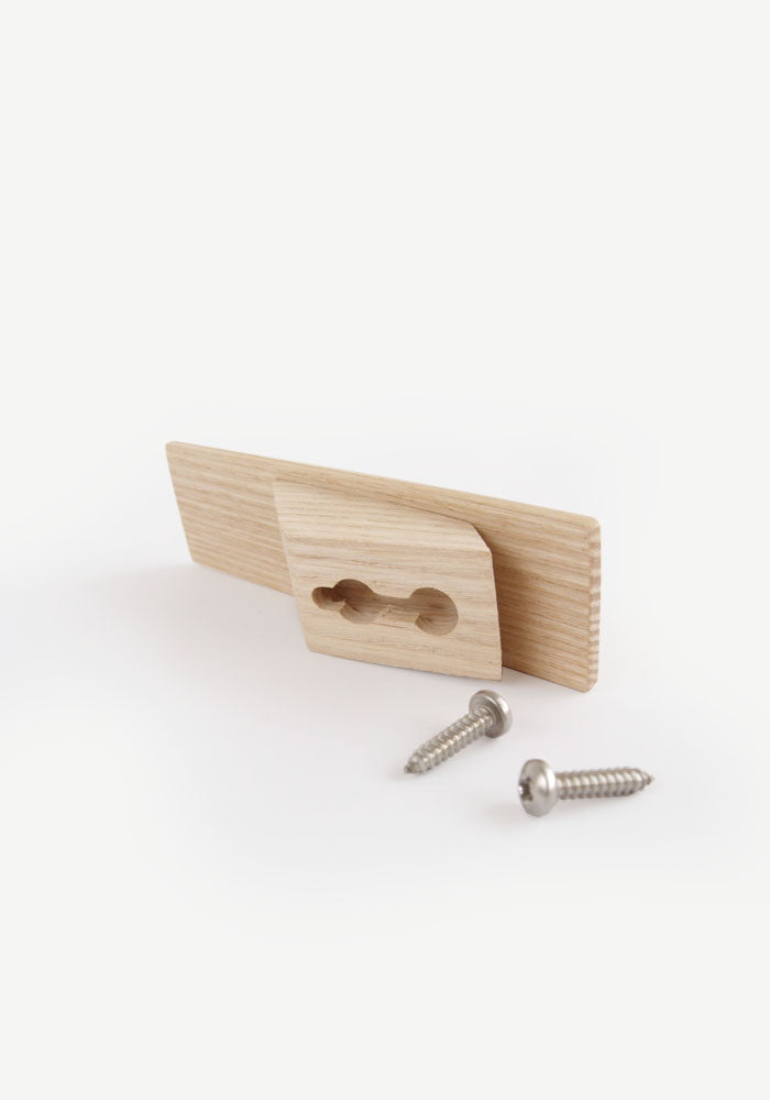 simple wooden wall hook made from ash with screws and hidden fixings